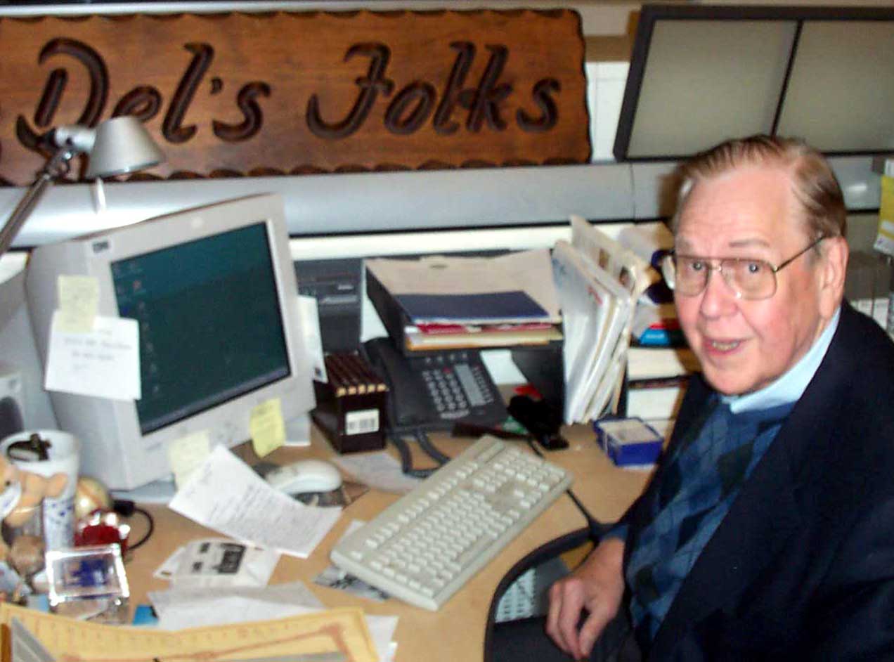 Del at his desk