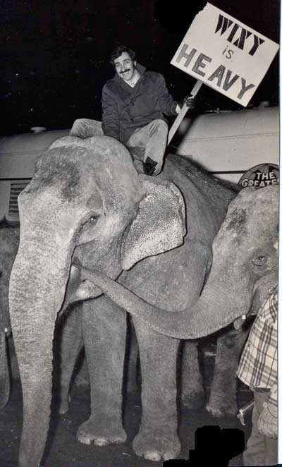 Larry Morrow promoting WIXY on an elephant